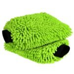 Hand wearing green chenille car wash mitt soaping up vehicle