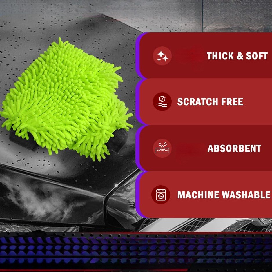 Hand wearing green chenille car wash mitt soaping up vehicle